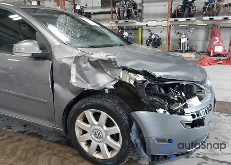 2009 Volkswagen Rabbit S from USA, damaged, VIN WVWDB71K39W142437